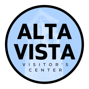 Light blue circle with white silhouette of the Altavista clock tower's outline, with bolt text in front that reads "Altavista Visitor's Center"
