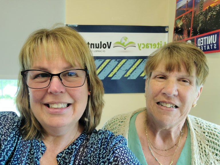 Headshot of two women in library